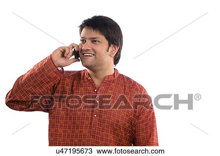 Man talking on a mobile phone View Large Photo Image Stock Image - Man talking on a mobile phone . Fotosearch