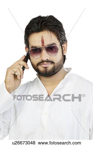 Man talking on a mobile phone View Large Photo Image Stock Photo - Man talking on a mobile phone . Fotosearch