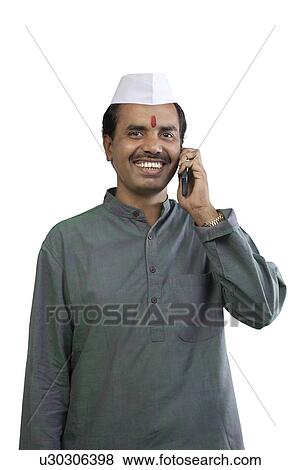 Man talking on a mobile phone View Large Photo Image Stock Photo - Man talking on a mobile phone . Fotosearch