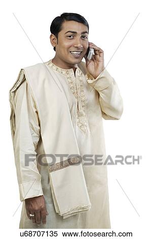 Man talking on a mobile phone View Large Photo Image Stock Photography - Man talking on a mobile phone . Fotosearch