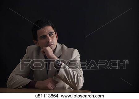 Picture - Man thinking. Fotosearch