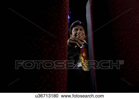 Man watching a movie View Large Photo Image Stock Image - Man watching a movie . Fotosearch