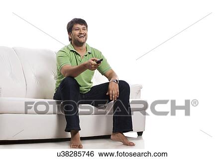 Man watching television View Large Photo Image Stock Photograph - Man watching television . Fotosearch