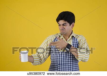 Man with a mug of tea View Large Photo Image Stock Image - Man with a mug of tea . Fotosearch