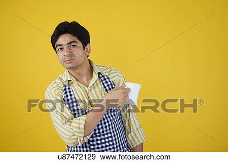 Stock Photo - Man with a mug of tea . Fotosearch