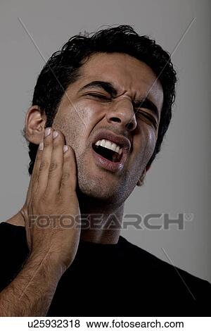 Man with a toothache View Large Photo Image Stock Photo - Man with a toothache . Fotosearch