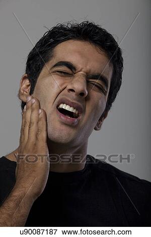 Stock Photo - Man with a toothache . Fotosearch