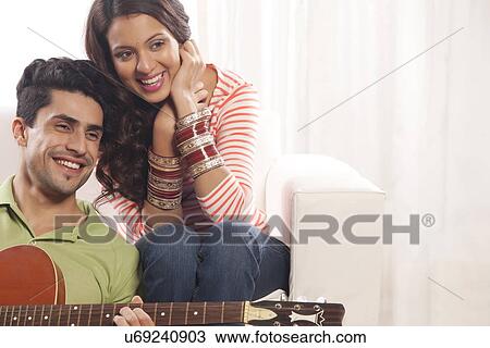 Married couple with guitar View Large Photo Image Stock Image - Married couple with guitar. Fotosearch