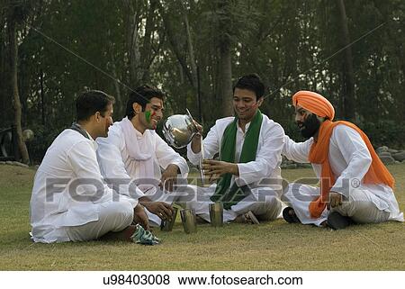 Stock Photo - Men having Bhang . Fotosearch