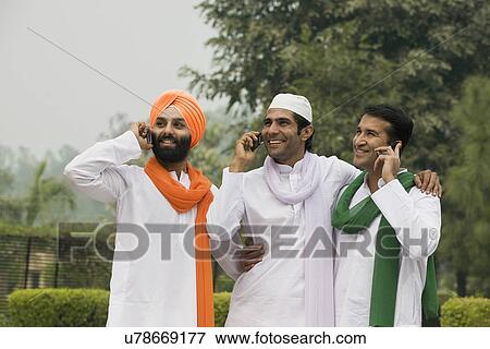 Stock Photo - Men talking on mobile phones . Fotosearch