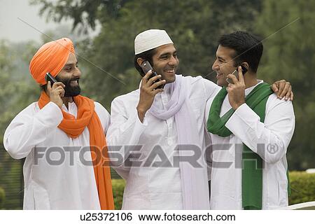 Men talking on mobile phones View Large Photo Image Stock Photograph - Men talking on mobile phones . Fotosearch