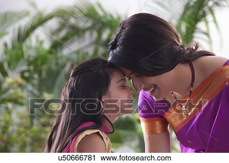 Stock Image - Mother and daughter enjoying . Fotosearch