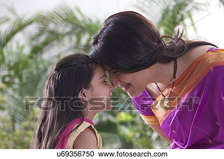 Stock Image - Mother and daughter enjoying . Fotosearch