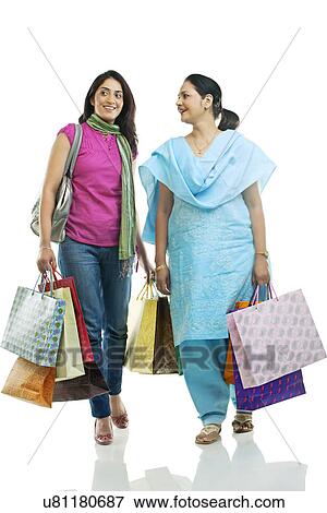 Stock Photo - Mother and daughter shopping . Fotosearch