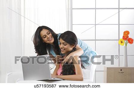 Mother and daughter spending time together View Large Photo Image Stock Photo - Mother and daughter spending time together . Fotosearch
