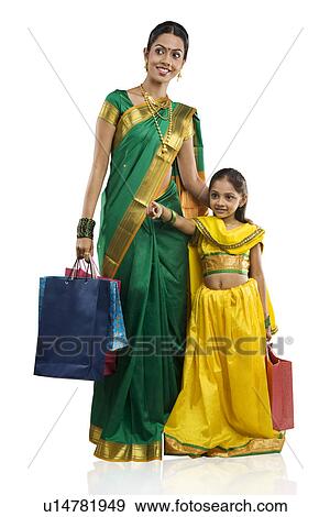 Mother and daughter with shopping bags View Large Photo Image Stock Photo - Mother and daughter with shopping bags . Fotosearch