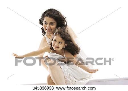 Mother holding her daughter View Large Photo Image Stock Image - Mother holding her daughter . Fotosearch