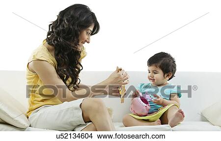 Picture - Mother playing with her child . Fotosearch