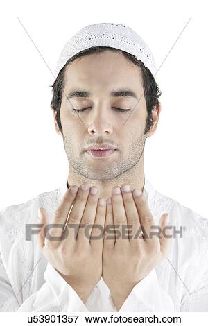 Muslim man doing Namaaz View Large Photo Image Stock Photo - Muslim man doing Namaaz . Fotosearch