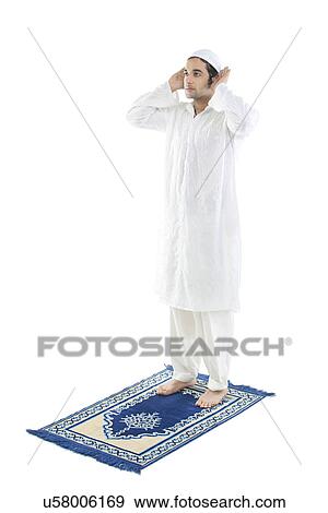 Muslim man praying View Large Photo Image Stock Photo - Muslim man praying . Fotosearch