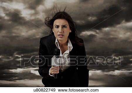 News presenter in storm View Large Photo Image Stock Photo - News presenter in storm . Fotosearch