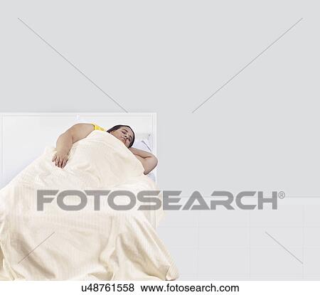 Obese woman sleeping View Large Photo Image Stock Photo - Obese woman sleeping . Fotosearch