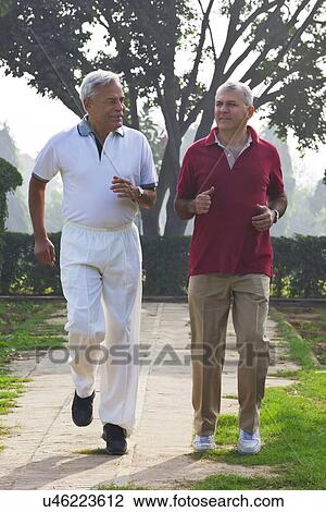 Stock Image - Old men going for a walk . Fotosearch
