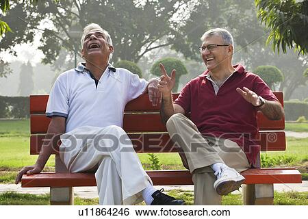 Old men sharing a laugh View Large Photo Image Stock Photograph - Old men sharing a laugh . Fotosearch