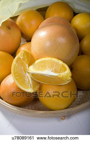 Oranges in a basket View Large Photo Image Stock Image - Oranges in a basket . Fotosearch