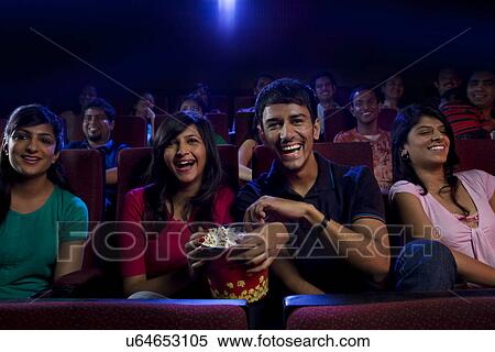 Stock Photography - People watching a movie . Fotosearch