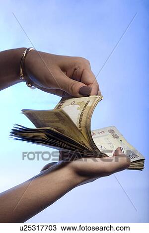 Person counting money View Large Photo Image Stock Image - Person counting money . Fotosearch