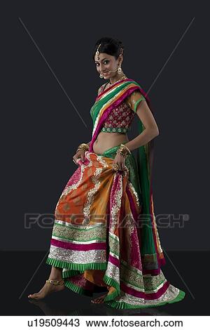 Stock Image - Portrait of a beautiful bride smiling. Fotosearch