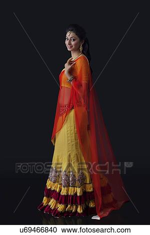 Stock Image - Portrait of a beautiful bride smiling. Fotosearch