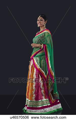 Stock Photograph - Portrait of a beautiful bride smiling. Fotosearch