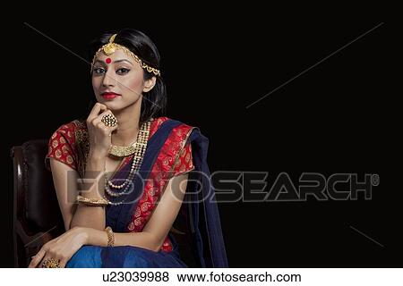 Portrait of a beautiful bride with jewelery View Large Photo Image Stock Photo - Portrait of a beautiful bride with jewelery. Fotosearch
