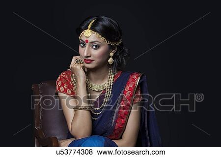 Portrait of a beautiful bride with jewelery View Large Photo Image Stock Photo - Portrait of a beautiful bride with jewelery. Fotosearch
