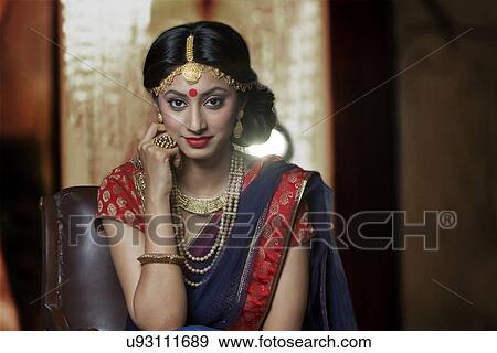 Portrait of a beautiful bride with jewelery View Large Photo Image Stock Photo - Portrait of a beautiful bride with jewelery. Fotosearch