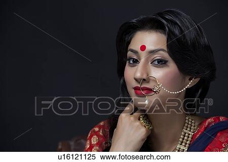 Stock Photography - Portrait of a beautiful bride with jewelery. Fotosearch