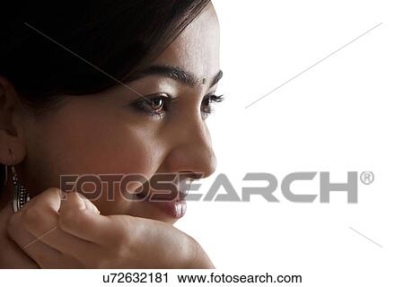 Stock Image - Portrait of a beautiful woman . Fotosearch