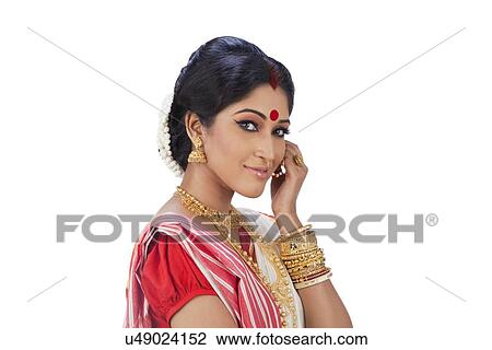 Stock Image - Portrait of a Bengali woman smiling. Fotosearch