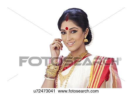 Stock Image - Portrait of a Bengali woman smiling. Fotosearch
