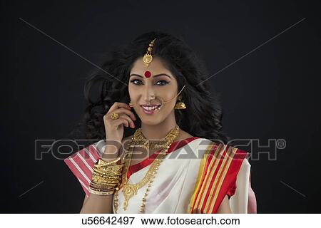 Portrait of a Bengali woman smiling View Large Photo Image Stock Photo - Portrait of a Bengali woman smiling. Fotosearch