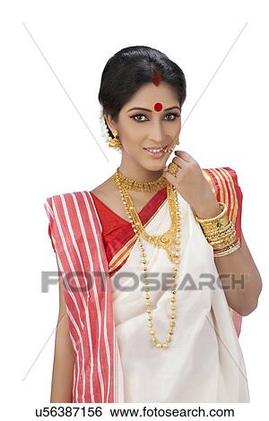 Stock Photograph - Portrait of a Bengali woman smiling. Fotosearch
