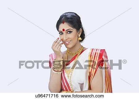 Stock Photograph - Portrait of a Bengali woman smiling. Fotosearch