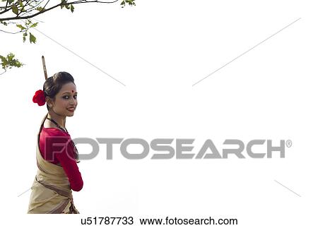 Stock Image - Portrait of a Bihu dancer . Fotosearch