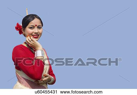 Stock Image - Portrait of a Bihu dancer . Fotosearch