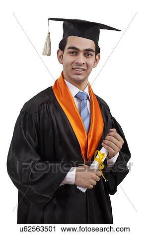 Stock Image - Portrait of a boy at graduation ceremony. Fotosearch