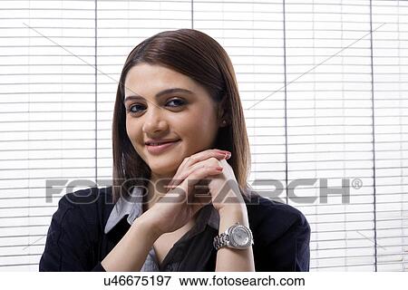 Portrait of a businesswoman in an office View Large Photo Image Stock Photo - Portrait of a businesswoman in an office . Fotosearch