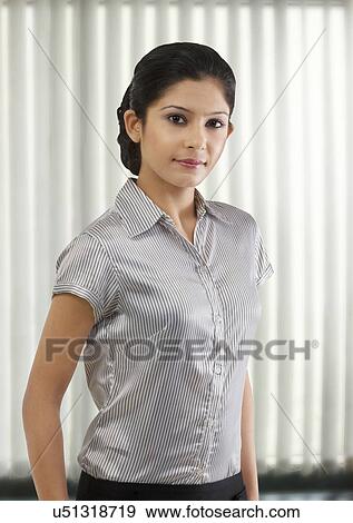 Stock Photo - Portrait of a businesswoman . Fotosearch