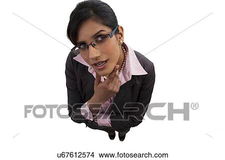 Portrait of a businesswoman thinking View Large Photo Image Picture - Portrait of a businesswoman thinking . Fotosearch